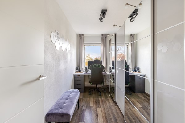 Foto - Te koop:  Verzorgde tussenwoning in Fijnaart!